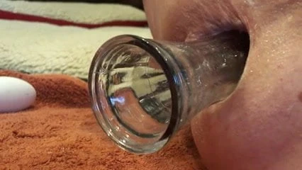Close up anal insertion gape toy dildo butt plug