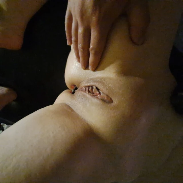 Oiled ass gets anal plug