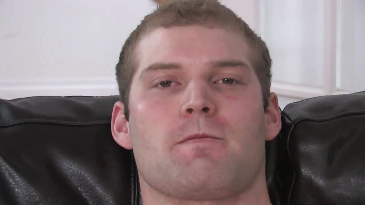 Big boy on the leather couch stroking it hard