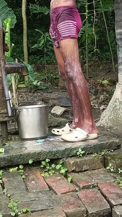 Black mature man bath in desi style. Showing big dick. | Clip 1