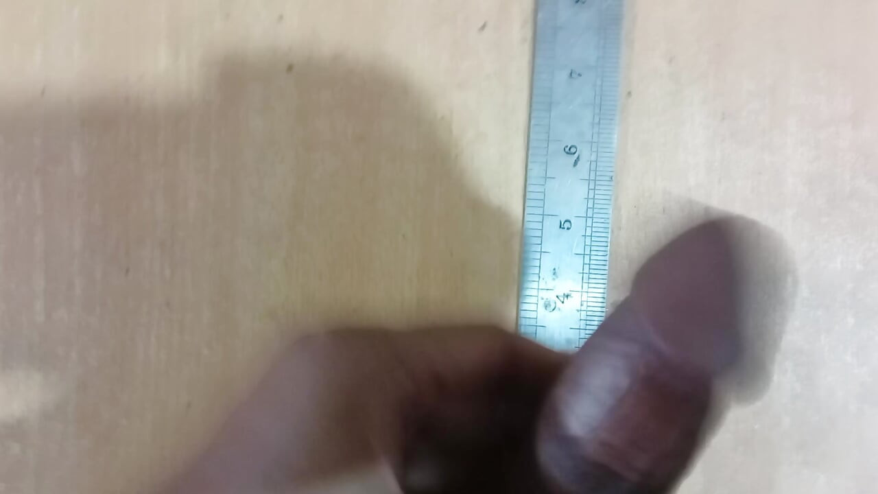 Desi boy Measure your own weight with a scale.