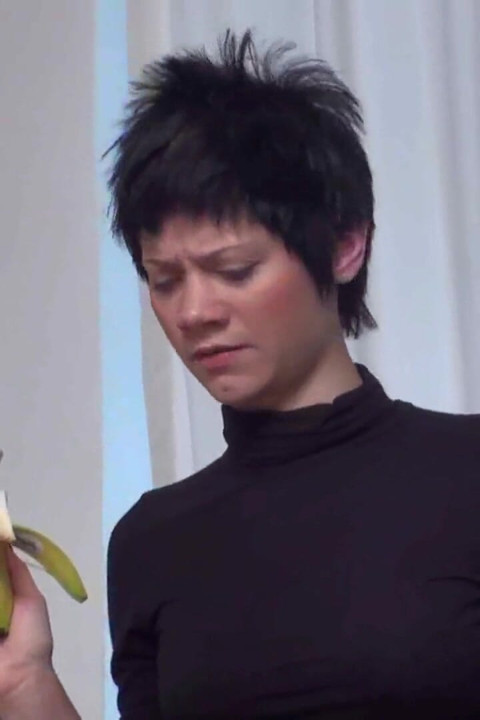 Good pet obeys and eats the banana thrown to him on the floor