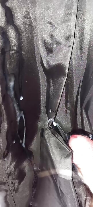 Ejaculating on the lining of her black leather coat