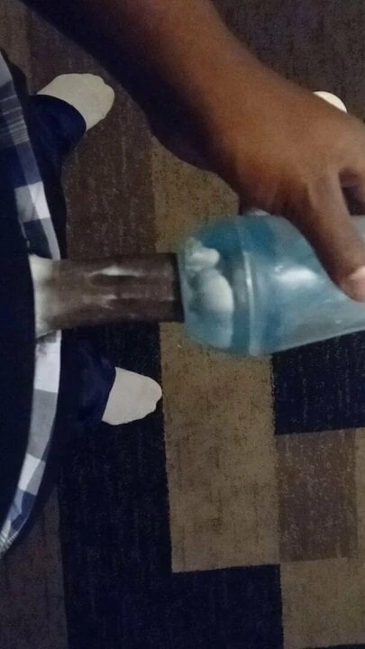 Cumming into flashlight