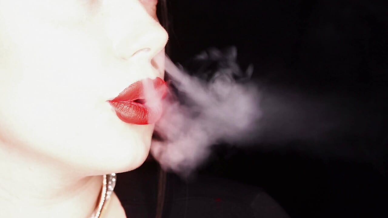 4K Applying red lipstick and smoking hookah on black background