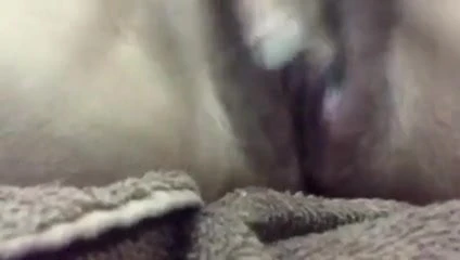 Young slutty thai girl films fingering herself on phone