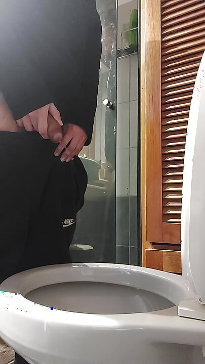 Peeing with a hard cock