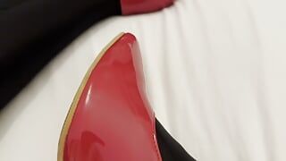 Here I'm wearing black nylon pantyhose jerking off my cock with final cumshot on my own red lacquer high heels