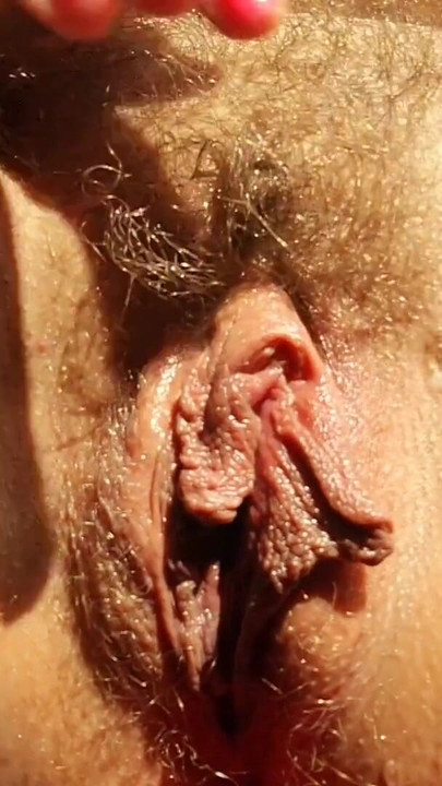 Memorable moment from "Closeup hairy huge pussy and long labia rubs her big clit and cums for you"
