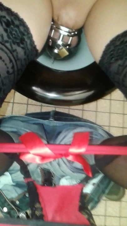 My Sissy by the public restroom (piss in chastity)
