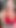 可愛らしいブルネットがセクシーな赤いランジェリーを試着