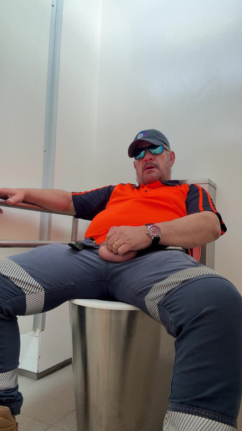 Horny man wanking in public toilet