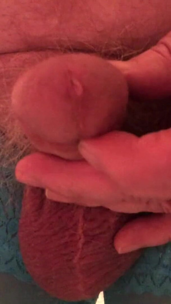 Iconic moment from "Pissing, then I oum 2 times.. Crossdresser twists his nipples, drips precum, pisses, estims and cums"