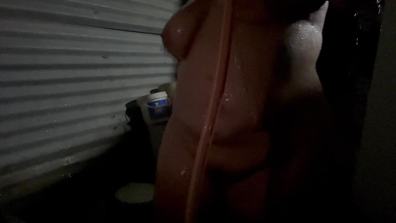 Girl records herself while taking a very sensual shower by touching her tits very rich and that tight pussy she has.