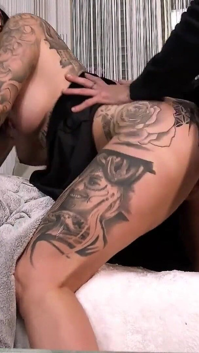 Captivating moment from "German Inked Mom Sendy Sugar seduce Young Guy to Cheating Fuck"