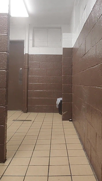 Key moment from "Playing inside and outside around a public bathroom"