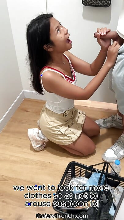 An 18-year-old Thai girl sucks me in a fitting room and I end up in her mouth