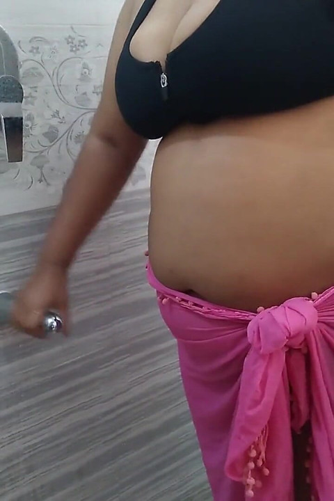 55-year-old Indian Stepmom Gets Sexually Excited and Has Sex with a Water Pipe in the Bathroom - Desi Sex