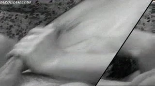 Two girls give a dude an awesome handjob.