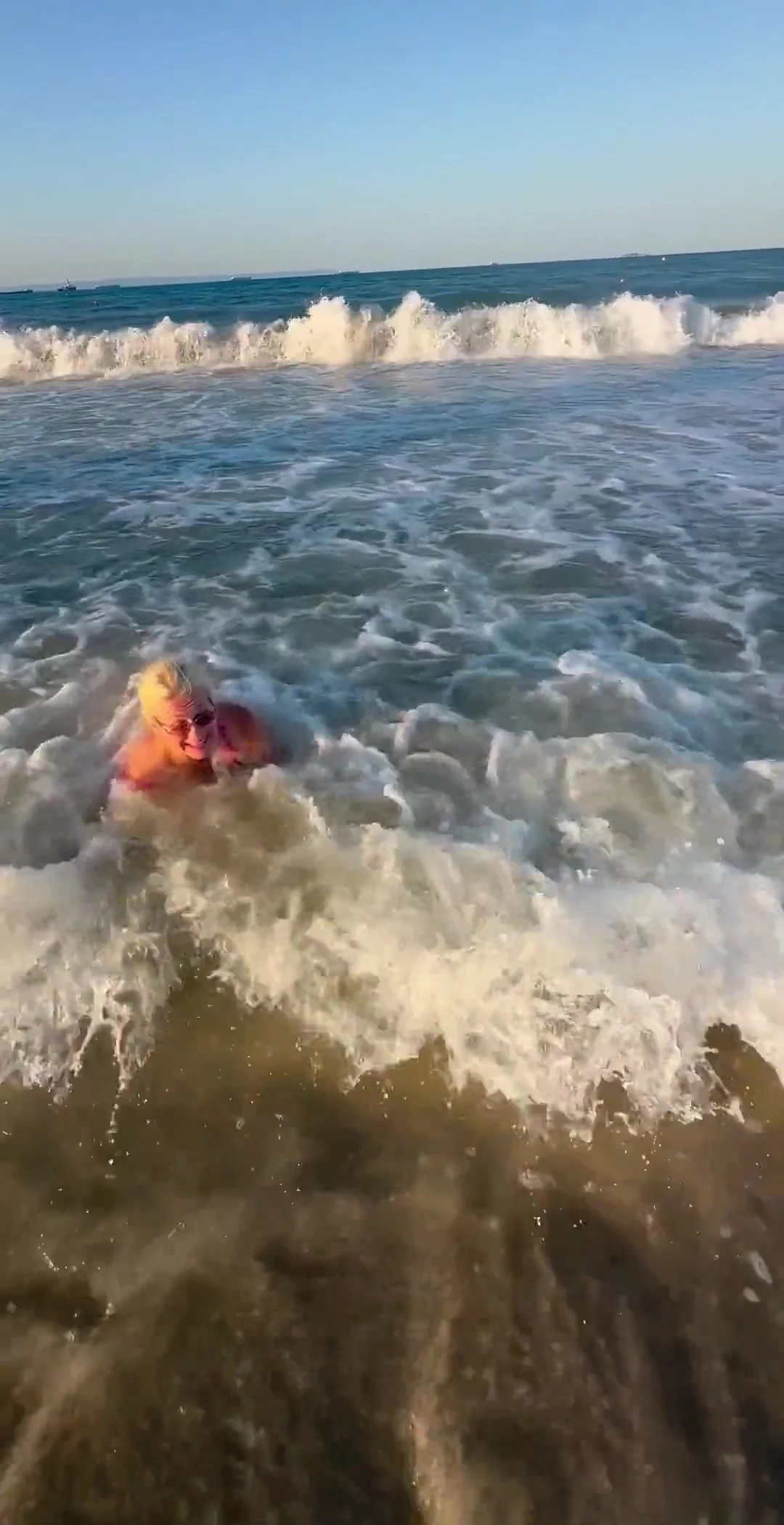 Try Not to Wet My Hair While Play with the Waves