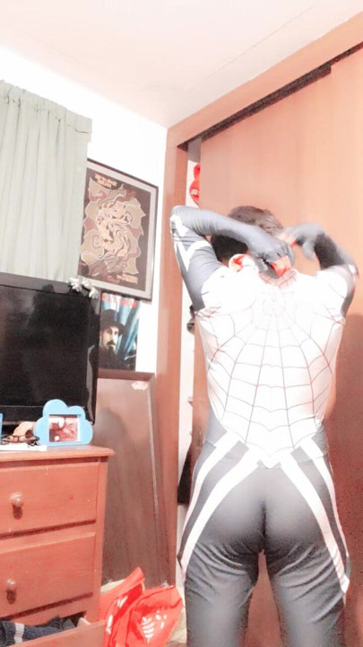 Femboy Spider-Man strips and shows his ass.