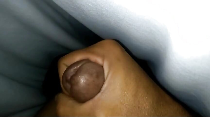 Boy getting feeling on the bed.