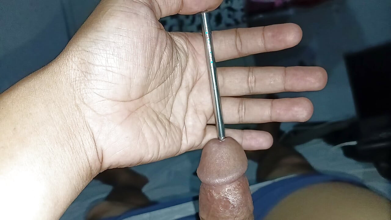 Plug two rods on the penis