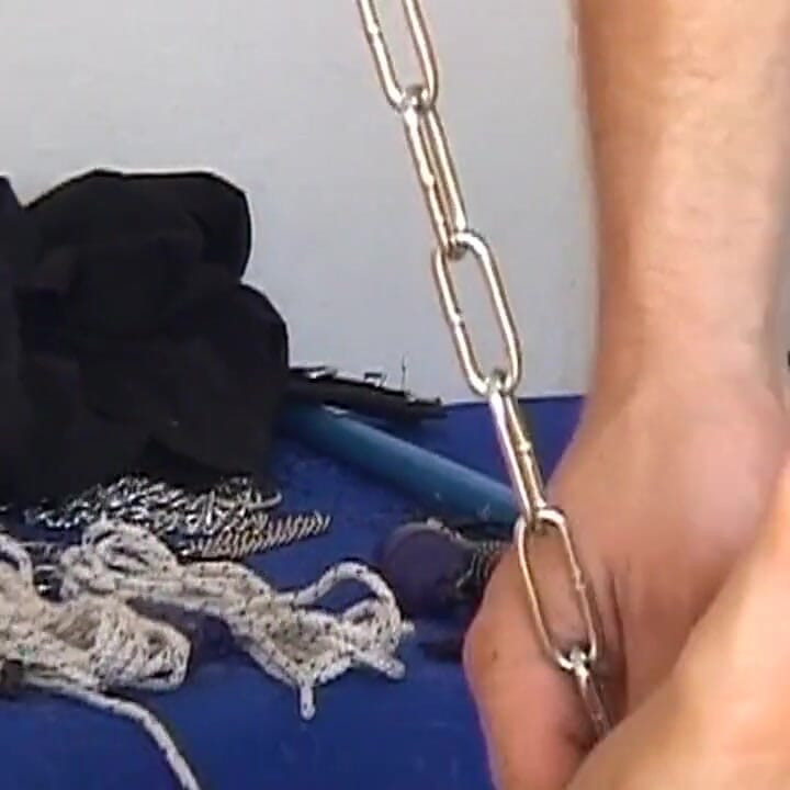 Chained Brunette MILF Swings Hard Taking Facial