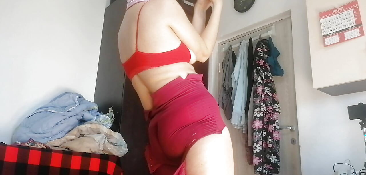 Amateur wife has fun trying on clothes and cutting them. Amateur wife vacuuming naked in the house.