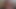 Golden temptress teases fiery-haired companion in the bath
