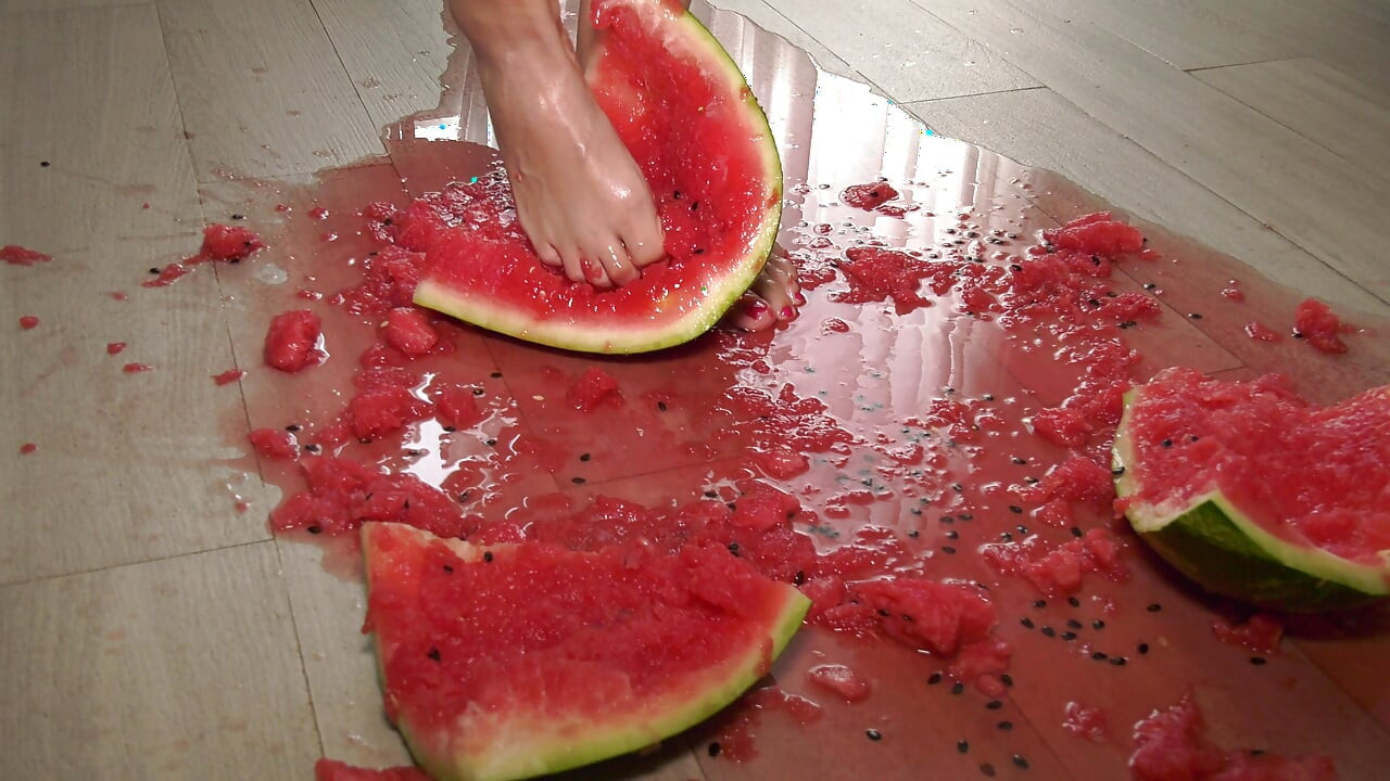 Busty MILF Presents Her Feet and Plays with a Watermelon