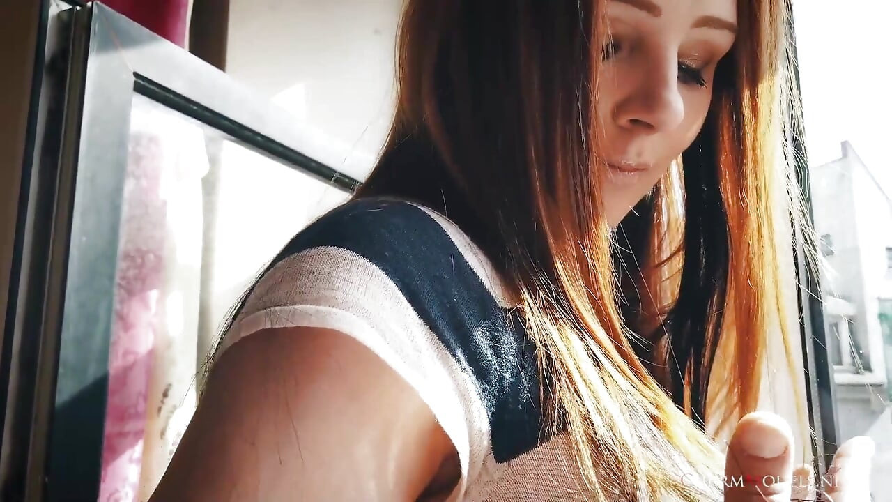 Lea in Sunshine Redhead Babe at the Window