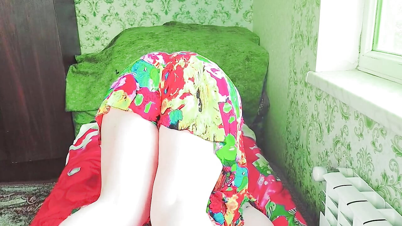 Cute sissy wearing fluffy earmuffs in cozy sweater