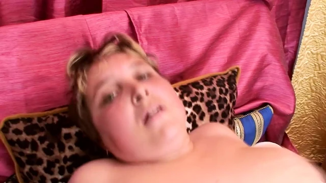 A stunning blonde MILF getting a big load of cum inside her mouth