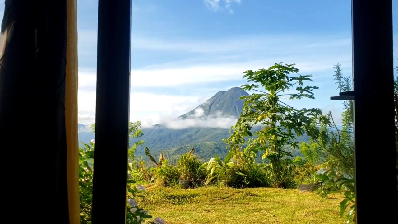 View of the ARENAL VOLCANO while they masturbate me