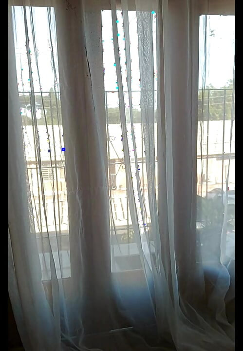 My stepmother trimming her hair and showing off to the street, filmed and sent me and asked if it was good.