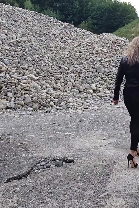 Grandma Is Walking Around a Gravel Pit in Tight Leggings and High Heels!