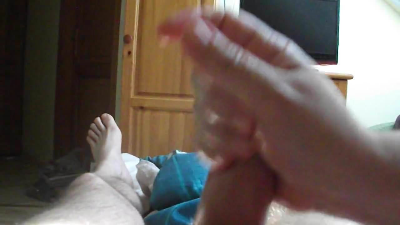 she is playing with my penis