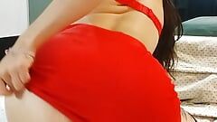 sexy dressed in red, masturbating with a dildo