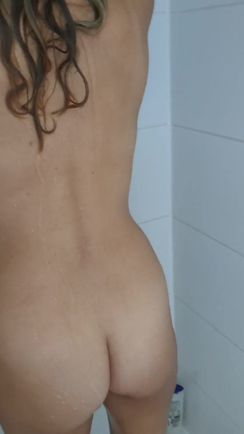 Spectacular moment from "My hot milf wife with big natural tits lets me film her taking a shower and shaving her pussy."