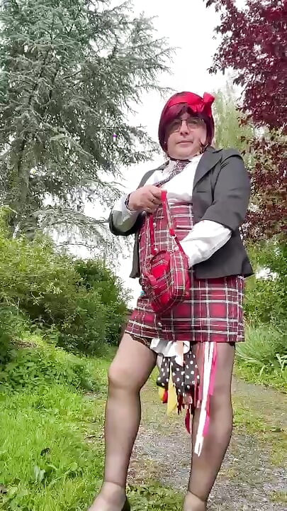 Dressed in a little plaid suspender skirt for an evening