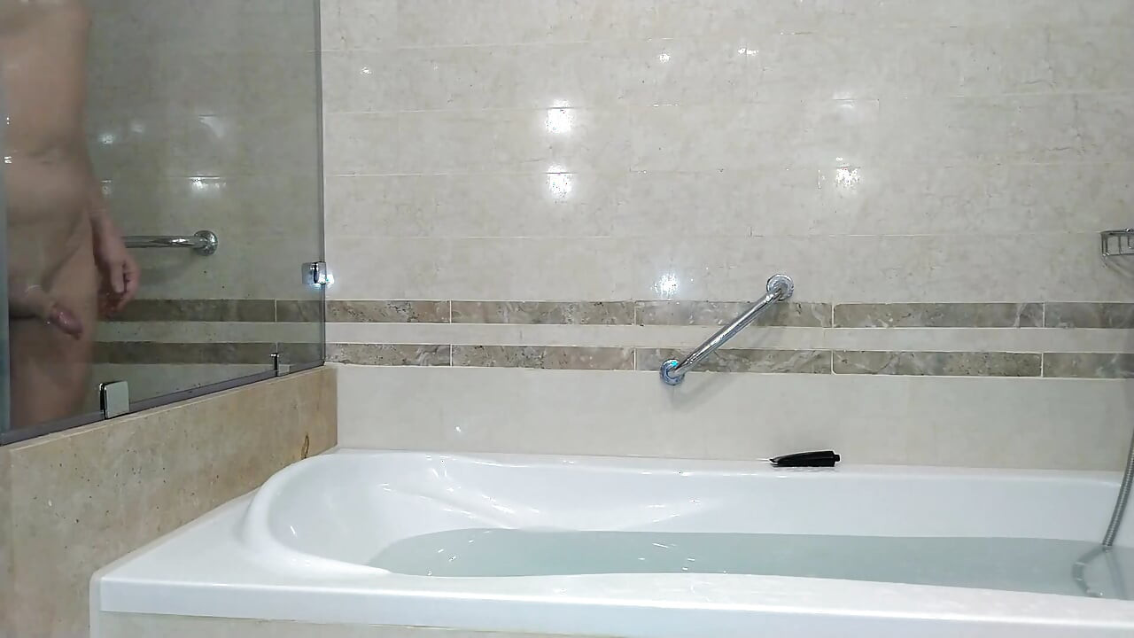 Kinky Mature Guy Masturbates in the Hotel's Room and Bathroom