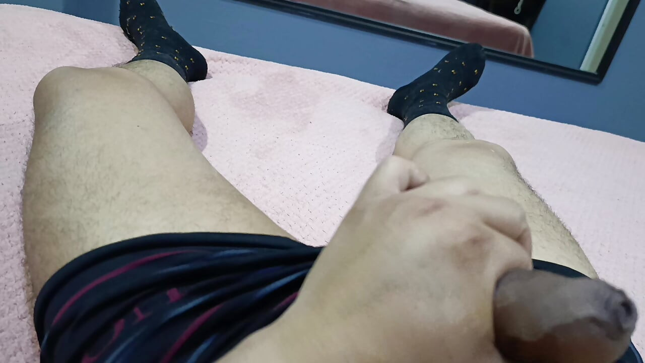 I massage my big cock on the hotel bed at night to really relax.