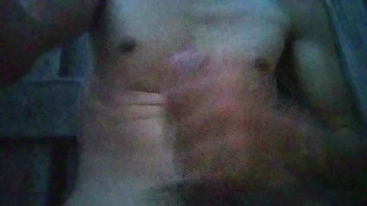 Young man plays with his big cock