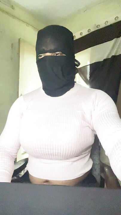 big tits pink top crossdresser showing boobs