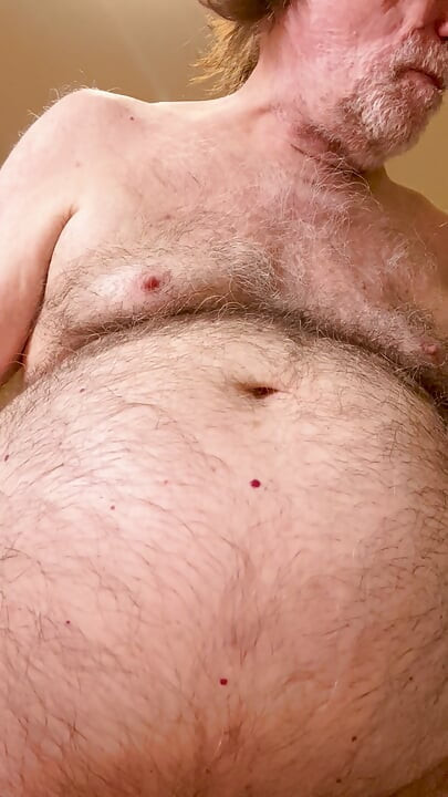 Coach Karl Rubs His Belly for You 6963