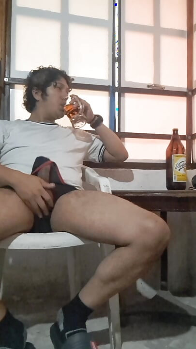 Drinking beer.