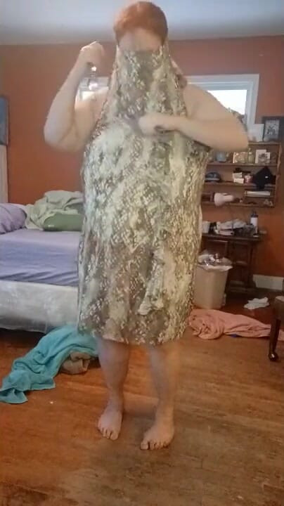 Dressing  in fluffy print dress from nude