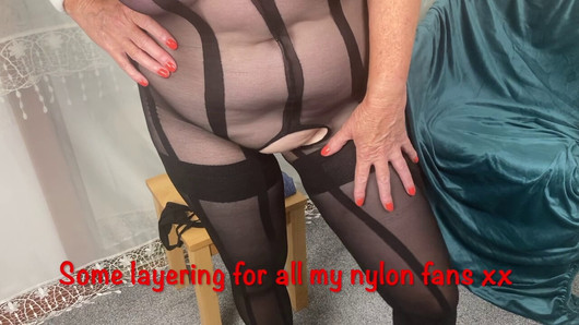 Mrs Mature Feet wearing a very sexy bodystocking and hold ups