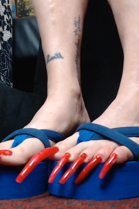 Extreme long long red toenails